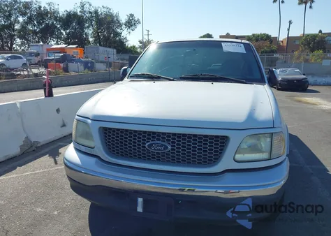 1999 Ford F-150 Lariat/Xl/Xlt из США, поврежденный, VIN 1FTRX17L0XKB52478